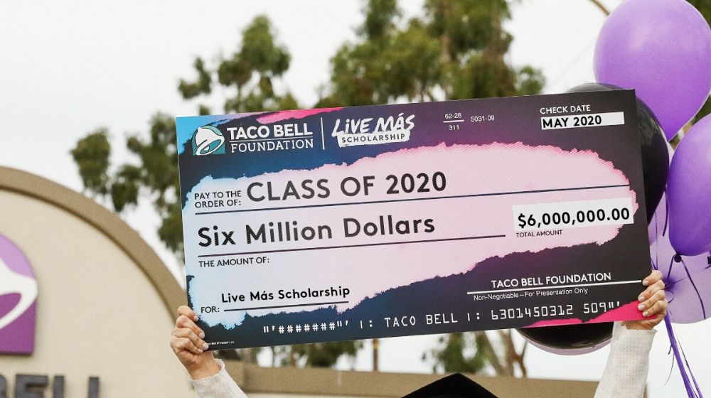 Giant Check | WATCH: Taco Bell Foundation Surprises Worker With Scholarship Money | Featured