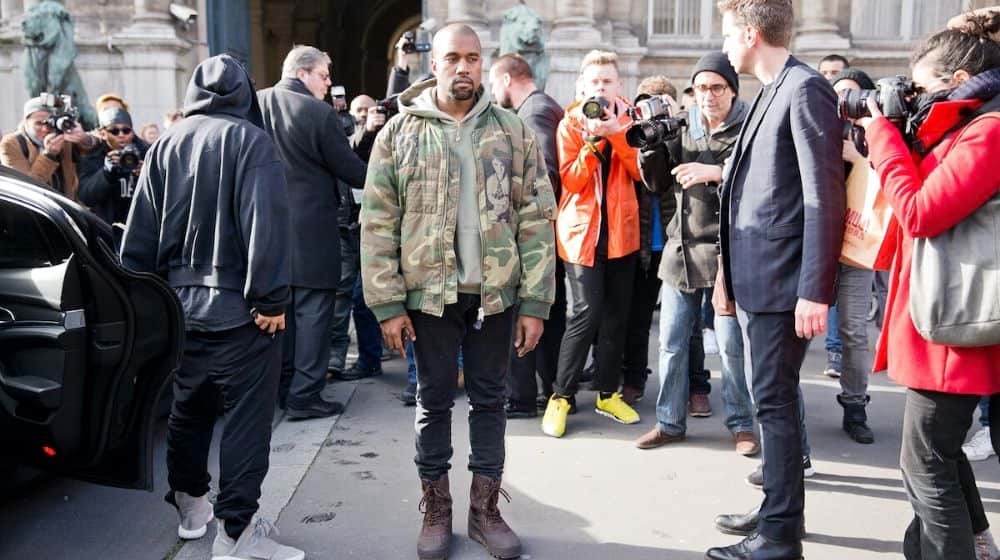 Kanye West attending fashion show | Check Out The Surprise Christian Music Album Kanye Dropped on Christmas Day | Featured