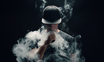 Man covered with vape smoke | Vaping industry Ad Urges Trump to Abandon Flavor Ban Proposal | Featured