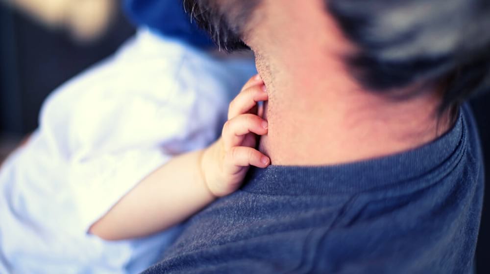 Father holding his son | STUDY: Diet Affects the Quality of Sperm 