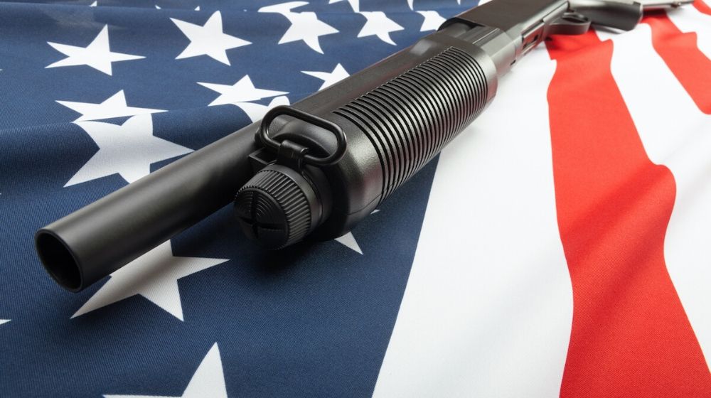 Shotgun on the USA Flag | More Counties Are Passing Measures to Protect the Second Amendment | Featured