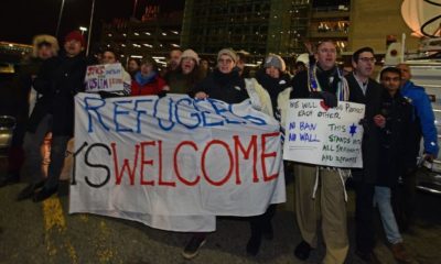 Activist protesting for detention of travelers | Clinton Appointed Judge Blocks Trump Order That Lets States, Cities Reject Refugees | Featured