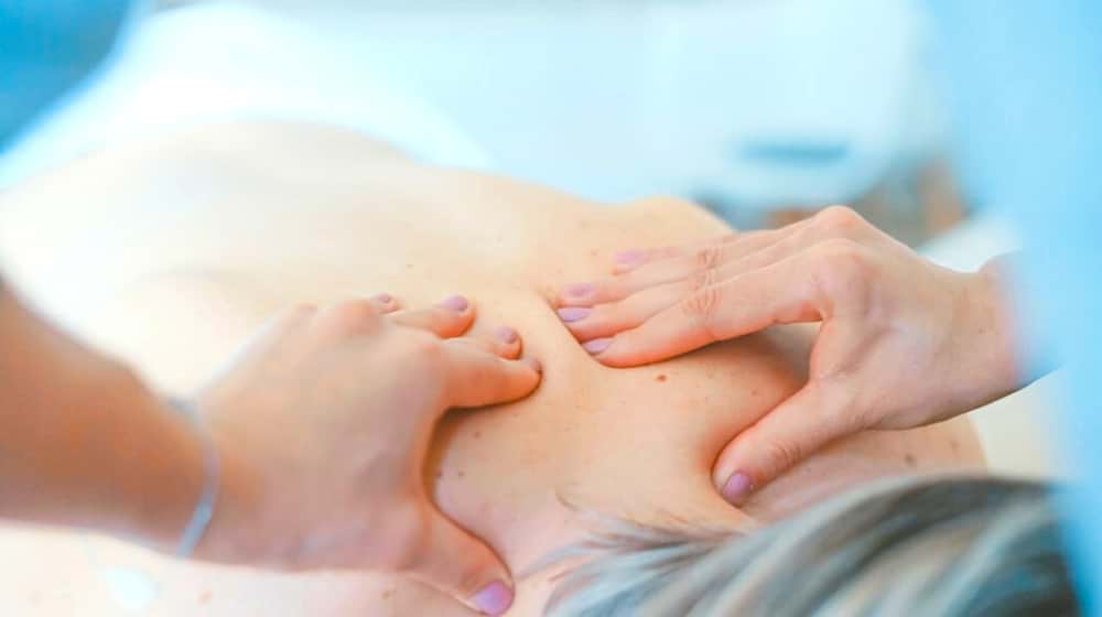 old woman having a massage | Vital Reasons You Should Get Regular Massages 