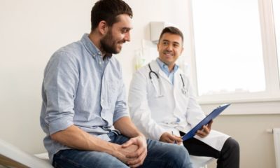 patient daily checkup with his doctor | Important Health Screenings Men Should Discuss with their Physicians | Featured