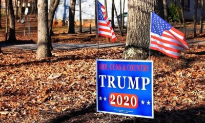 Trump 2020 banner with US flag| 'Trump 2020' Sign Stolen From Navy Veteran's Home | Featured