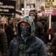 Antifa protestor | Antifa Plans Massive Protests in NY Subways Ending Police Presence | Featured