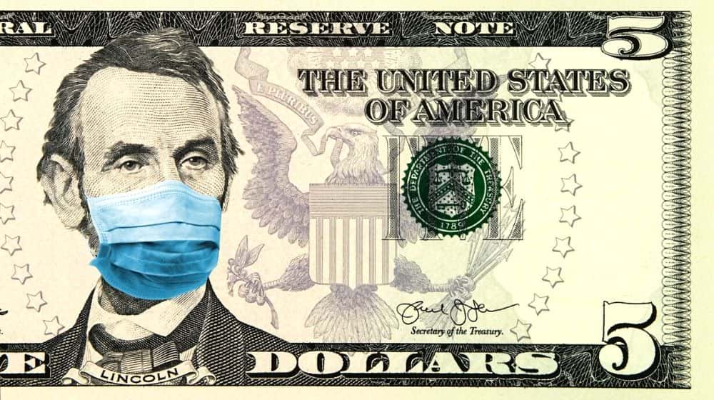 5 Dollar banknote with face mask | Coronavirus Leads to Worst Week for Markets since Financial Crisis | Featured
