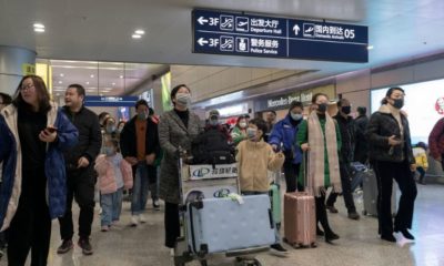 Travellers at the airport wearing face mask | Coronavirus Cases Outside of China Rise to 92 | Featured