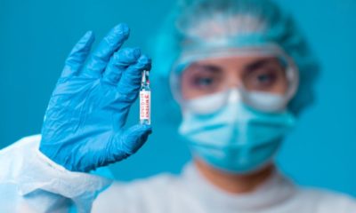 doctor holding a covid-19 vaccine | Coronavirus: How Soon Will a Vaccine Be Ready? | Featured