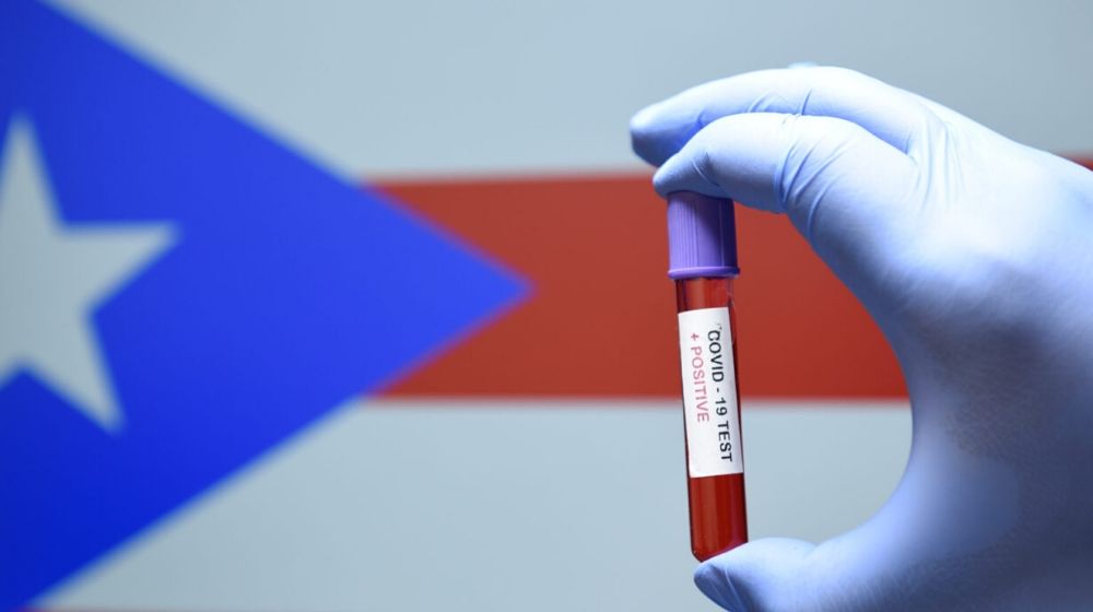blood sample with Puerto Rico flag at the back | Featured