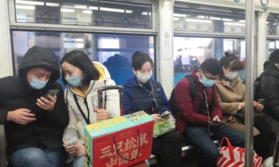 chinese passenger inside a train | Chinese Officials Suggest That U.S. Army Brought the Coronavirus to Wuhan | Featured