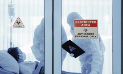 coronavirus patient in quarantine room with nurses | 2 U.S. ER Doctors Currently in Critical Condition Following Coronavirus Pandemic | Featured