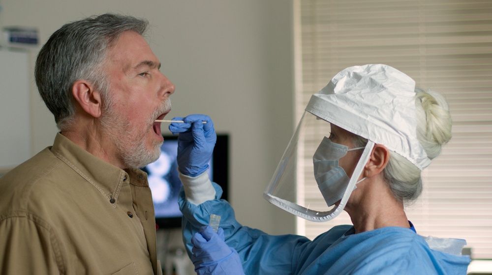 Old man having a swab test | South Korea to Ship 600,000 Coronavirus Testing Kits to U.S. on Tuesday | Featured