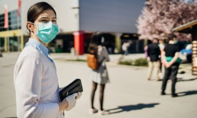 shopper wearing mask | Some Countries and US States Move to Ease Virus Lockdowns | Featured