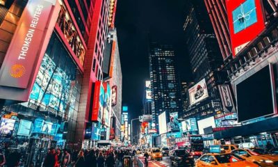 Busy time square at night | Trump Reveals Plan to Reopen U.S. Economy | Featured
