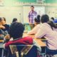 student listening to their teacher | Trump Claims 'Total' Authority, Over Governors, to Reopen Economy | Featured