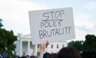 Stop Police Brutality Protest Sign | GOP Proposals Seek to Curb Police Brutality | Featured
