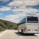 Long Haul Bus for Tourists Drives through the Open Roads | While Other Businesses Reopen, Tour Bus Industry Continues to Suffer | Featured