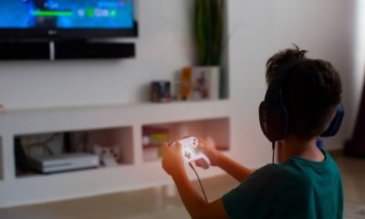 Back View of Concentrated Young Gamer Playing Game | FDA Approves Video Game Designed for Children with Certain ADHD Symptoms | Featured