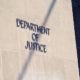 Department of Justice Sign | DOJ Moves to Limit Internet Content Protections | Featured