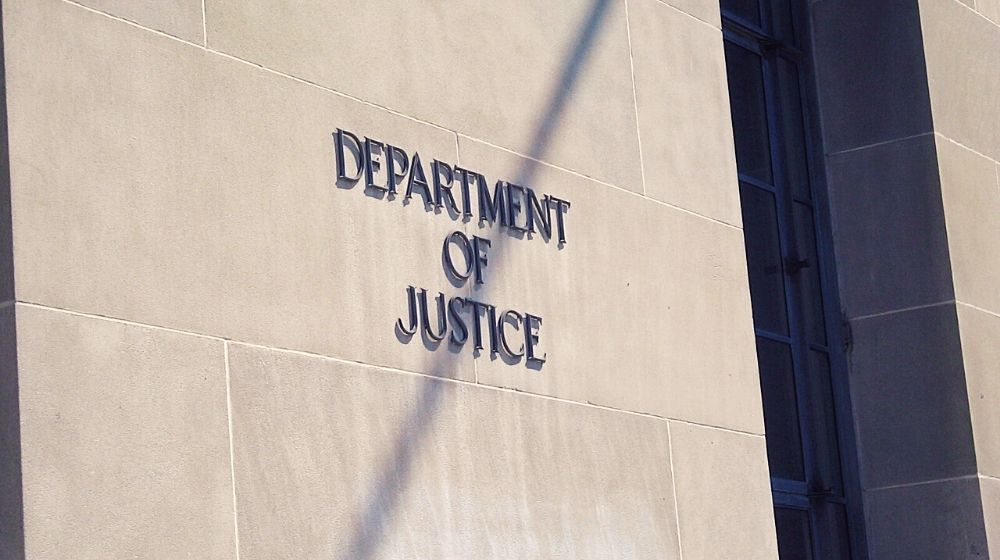 Department of Justice Sign | DOJ Moves to Limit Internet Content Protections | Featured
