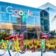 Google Headquarters with Bikes on Foreground | Google Announces It Will Pay News Publishers for “High-Quality Content” | Featured