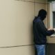 Thief with Black Balaclava in Front of ATM Machine | Man Dies After Attempting to Break into an ATM Using Explosives | Featured