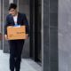Male and Female Carrying their Box | COVID-19 Pandemic Amplifies That College Graduates Are More Likely to Be Protected from Unemployment | Featured