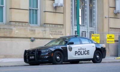 Police Vehicle Parked on the Street | Two Buffalo Police Officers Suspended After Video Shows Elderly Man Falling to the Ground and Bleeding | Featured