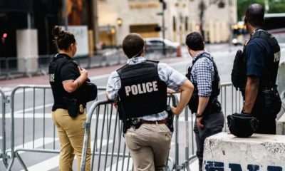 Police guarding New York property | NYC Detectives’ Union Vows to Sue Violent Protesters | Featured