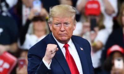 President Donald Trump Gestures the Confident Fist Pump on Stage | Trump Postpones Campaign Rally in Tulsa to June 20 | Featured
