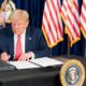 President Donald Trump signing a Presidential memorandum | Trump Signs Executive Order on Police Reform | Featured