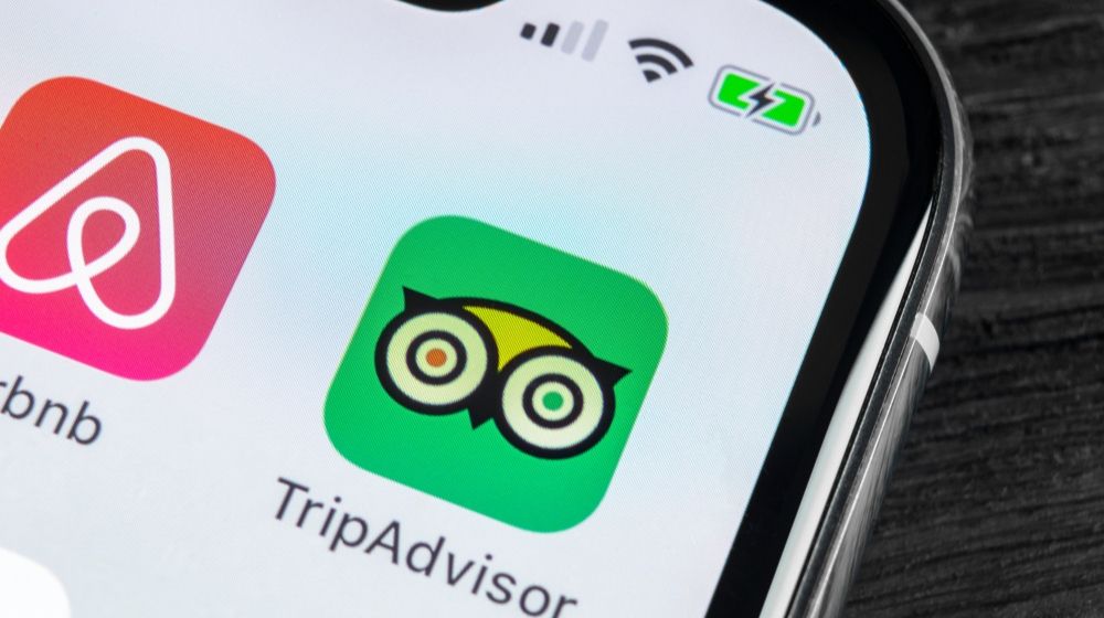 Tripadvisor application icon on Apple iPhone X | TripAdvisor Releases Report: “Beyond COVID-19: The Road to Recovery for the Travel Industry” | Featured