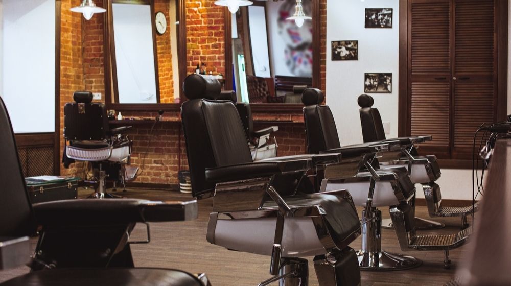 Vintage Chairs in Barbershop | 77-Year-Old Barber Who Kept Shop Open Despite Lockdown Orders Had His License Reinstated | Featured