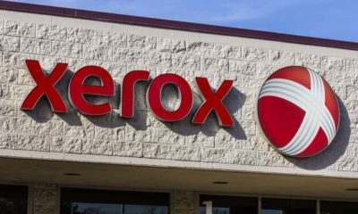 Xerox Corporation Logo and Signage at a Customer Care Center | Xerox Announces App That Tracks Employees with Their Consent | Featured