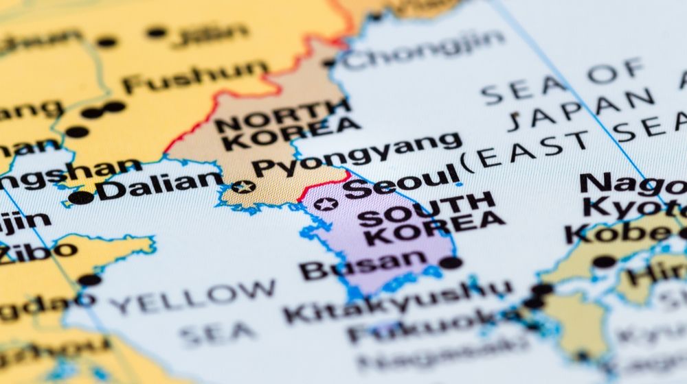 Close Up of a World Map with the Border Between North and South Korea in Focus | Tensions Currently Soaring in Asia | Featured