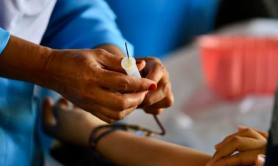 A Nurse Attending to a Blood Donor | Trump Calls on COVID-19 Survivors to Donate Blood Plasma | Featured