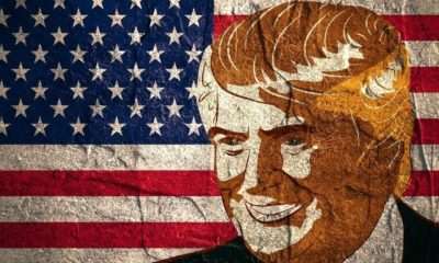 An Illustration of a Portrait of Republican Presidential Candidate Donald Trump on National Flag Background | Activist Burns Trump Flag Outside Lackawanna County Courthouse | Featured