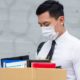 Asian Businessman Wearing Face Mask | U.S. Unemployment Rate Drops to 11.1 Percent Last Month | Featured