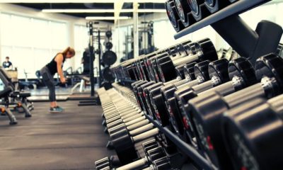 woman exercising alone in the gym | New Jersey Gym Owners Are “Not Backing Down” Against COVID-19 Shutdown | Featured