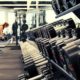 woman exercising alone in the gym | New Jersey Gym Owners Are “Not Backing Down” Against COVID-19 Shutdown | Featured