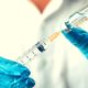 Doctor, Nurse, Scientist, Researcher Hand in Blue Gloves | First Coronavirus Vaccine to Be Tested in U.S. Boosts Participants’ Immune Systems | Featured