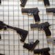 Appeals court reverses bump stock ban - Gun Wall Rack with Firearms | Number of Firearm Background Checks Reaches Highest in Years | Featured