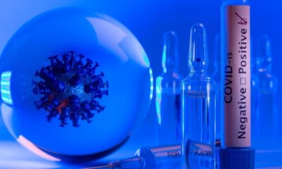 Mockup of Virus in a Glass Sphere, Positive Covid-19 Test | False Positive COVID-19 Test Results Abound in Florida | Featured