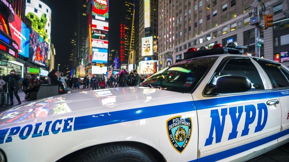 NYPD Police Car Stands Parked in Times Square | Man Who Punched NYPD Officers Has Been Released Without Bail | Featured