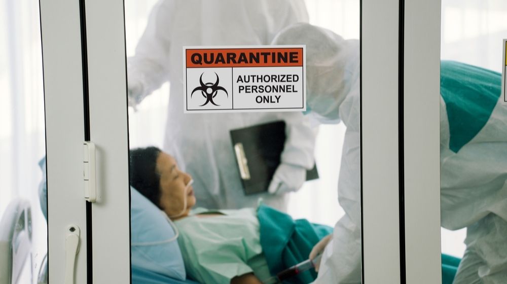 Quarantine Signage in Front of Quarantine Room | Florida Sets Record High in Daily COVID-19 Deaths | Featured