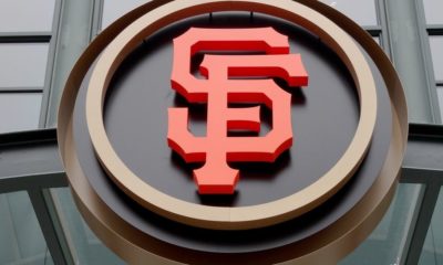SF Logo During Day at the Entrance of the Ballpark | San Francisco Giants Manager and Several Players Kneel During National Anthem | Featured