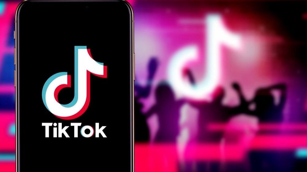 Smartphone with TikTok Logo | US Weighs TikTok Ban | Featured