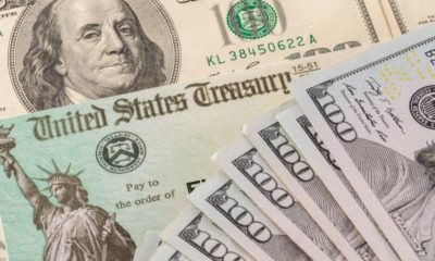 Stack of 100 Dollar Bills with Illustrative Coronavirus Stimulus Payment Check | GOP Struggles to Unite on Stimulus Talks | Featured