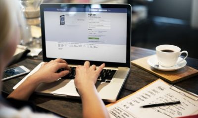 Young Woman Using Facebook Application on Her Laptop | Facebook on Ad Boycotts: “Facebook Does Not Profit from Hate” | Featured
